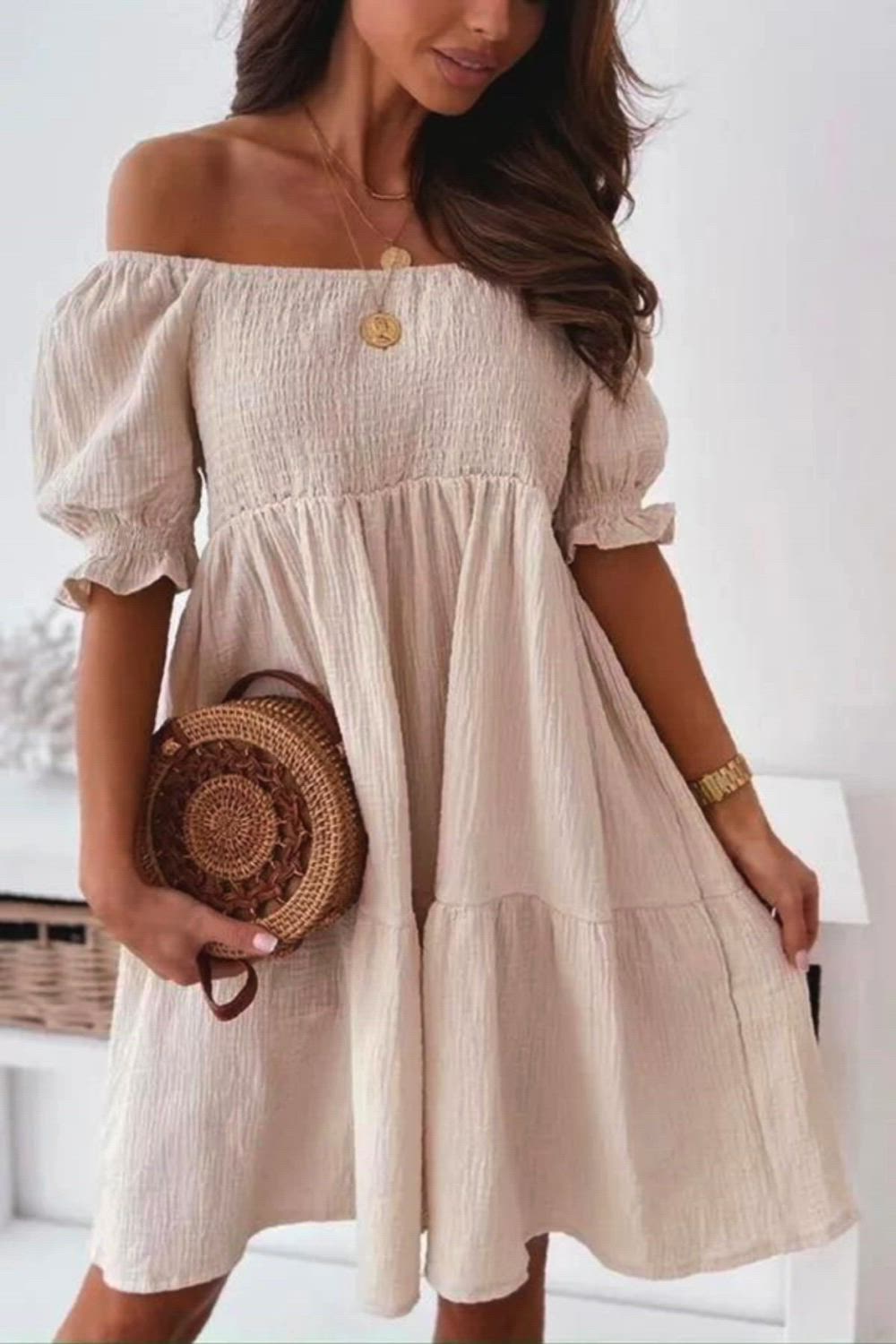 Revitalize your wardrobe with our Off-The-Shoulder Smocked Loose Dress. Effortlessly chic, the off-the-shoulder design adds a touch of allure, while the smocked details provide a comfortable and flattering fit. The loose silhouette ensures a relaxed, yet stylish look, perfect for any casual occasion. Crafted from quality fabric, this dress promises both comfort and durability.