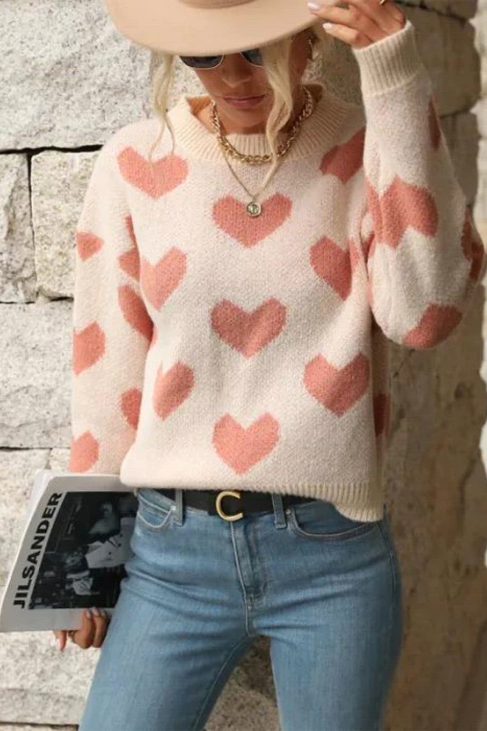 Elevate your style with our New Fashion Casual Love Long Sleeve Pink Knitted Sweater. This trendy piece combines fashion and comfort seamlessly. With its long sleeves, cozy knitted fabric, and a touch of love, it's the perfect choice for a relaxed yet chic look. Upgrade your wardrobe with this fashionable and cozy addition.