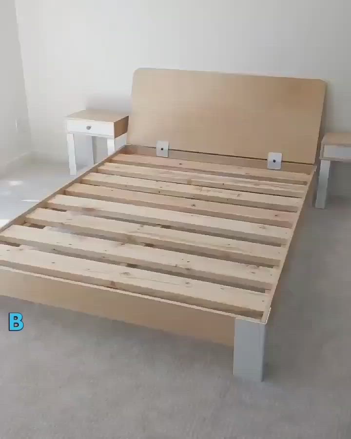 This may contain: a bed frame made out of wood with two night stands