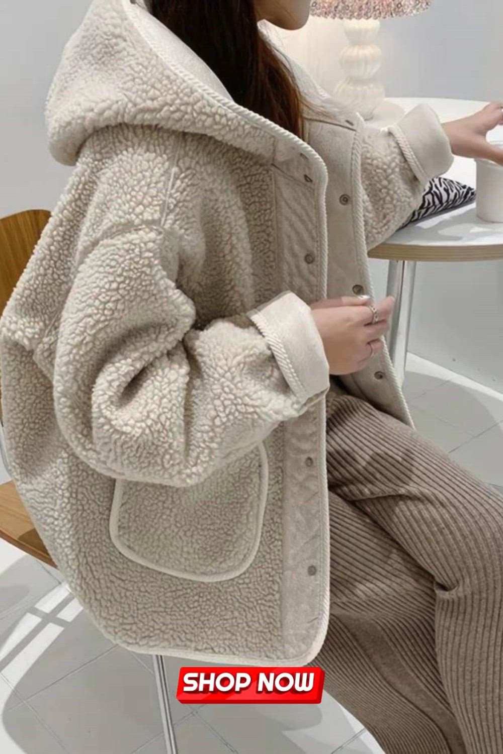 Stay warm and stylish in this Solid Hooded Teddy Coat. With its casual button-front design and long sleeves, it's the perfect winter outerwear. Embrace comfort and fashion as you navigate the chilly season in this cozy and chic piece.