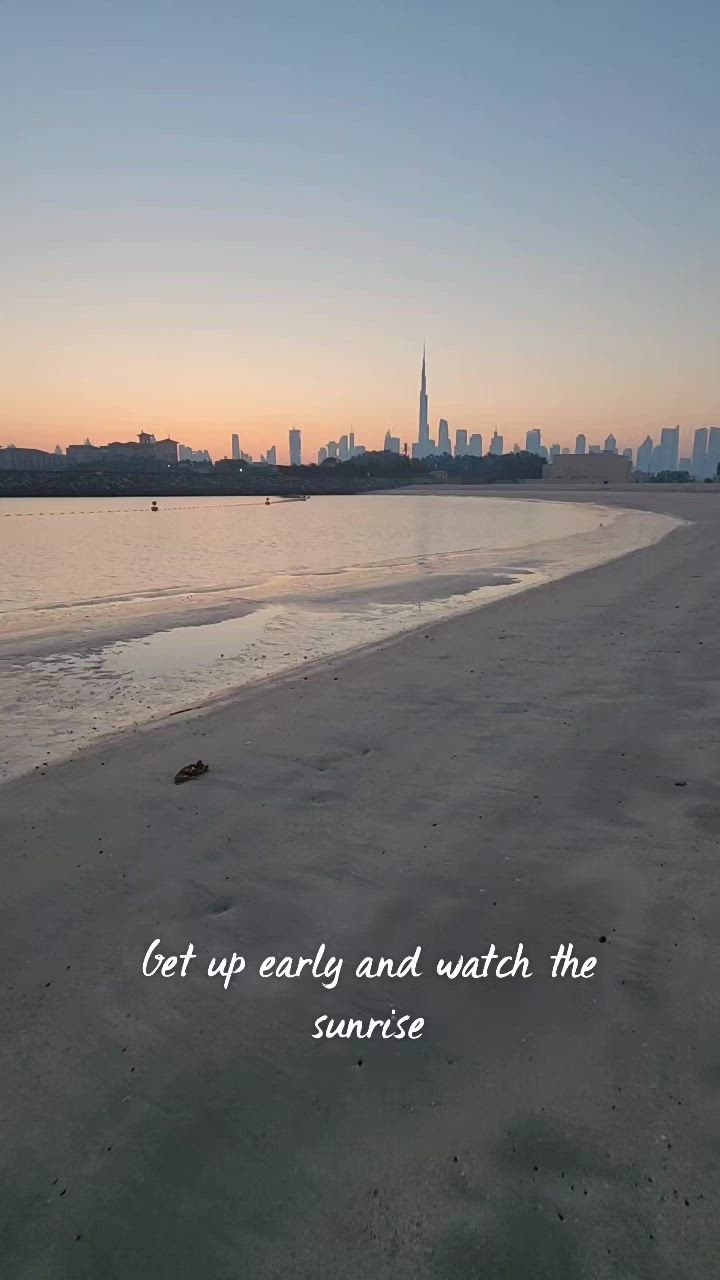 This may contain: an image of the beach at sunset with words written on it that says, get up early and watch the sunrise