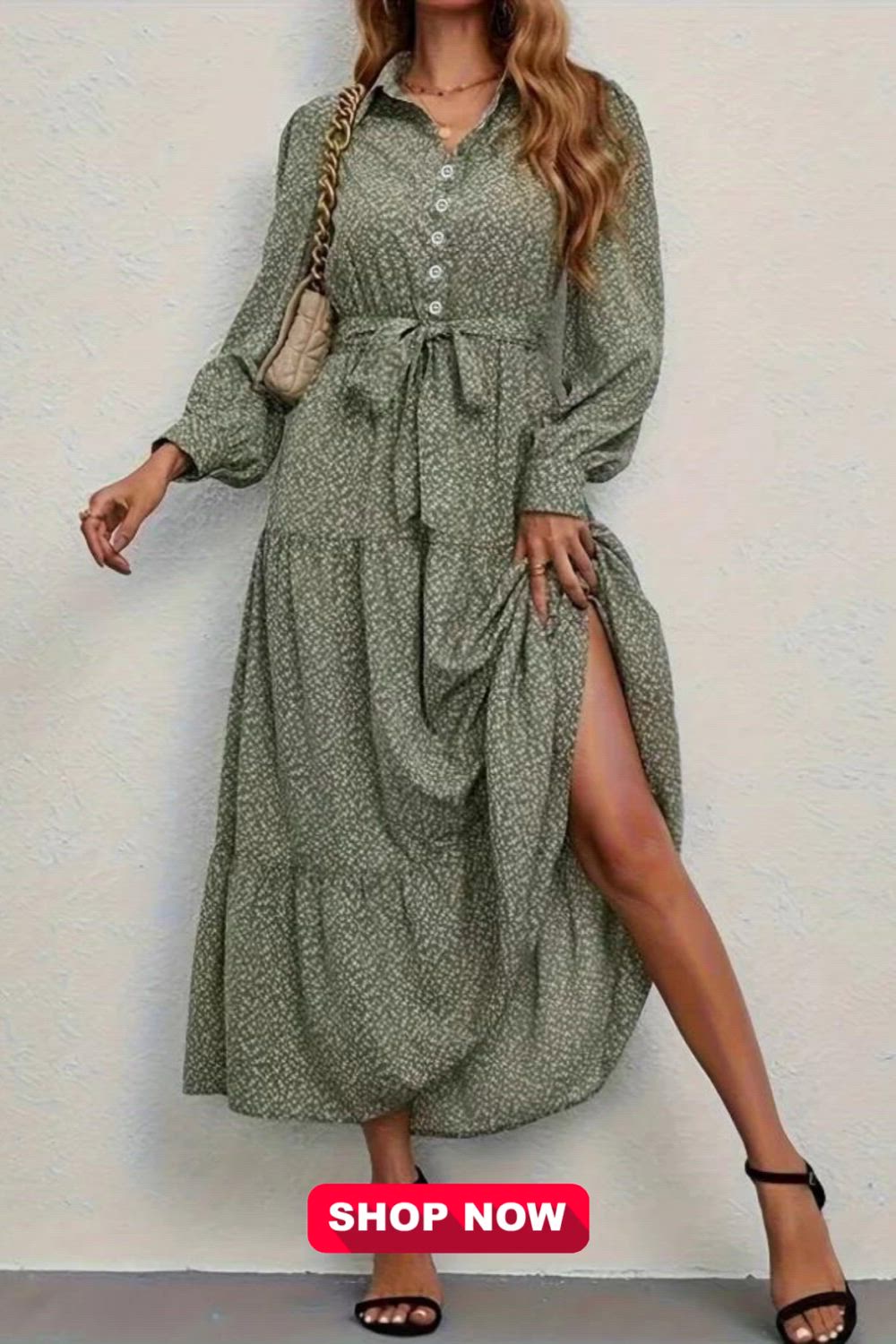 This sophisticated long-sleeve dress showcases an elegant button front and an all-over print in a tiered design. The dress exudes grace and style with its refined details, offering a perfect balance between trend and sophistication. Ideal for various occasions, it's a chic choice for those seeking a fashionable yet timeless ensemble.