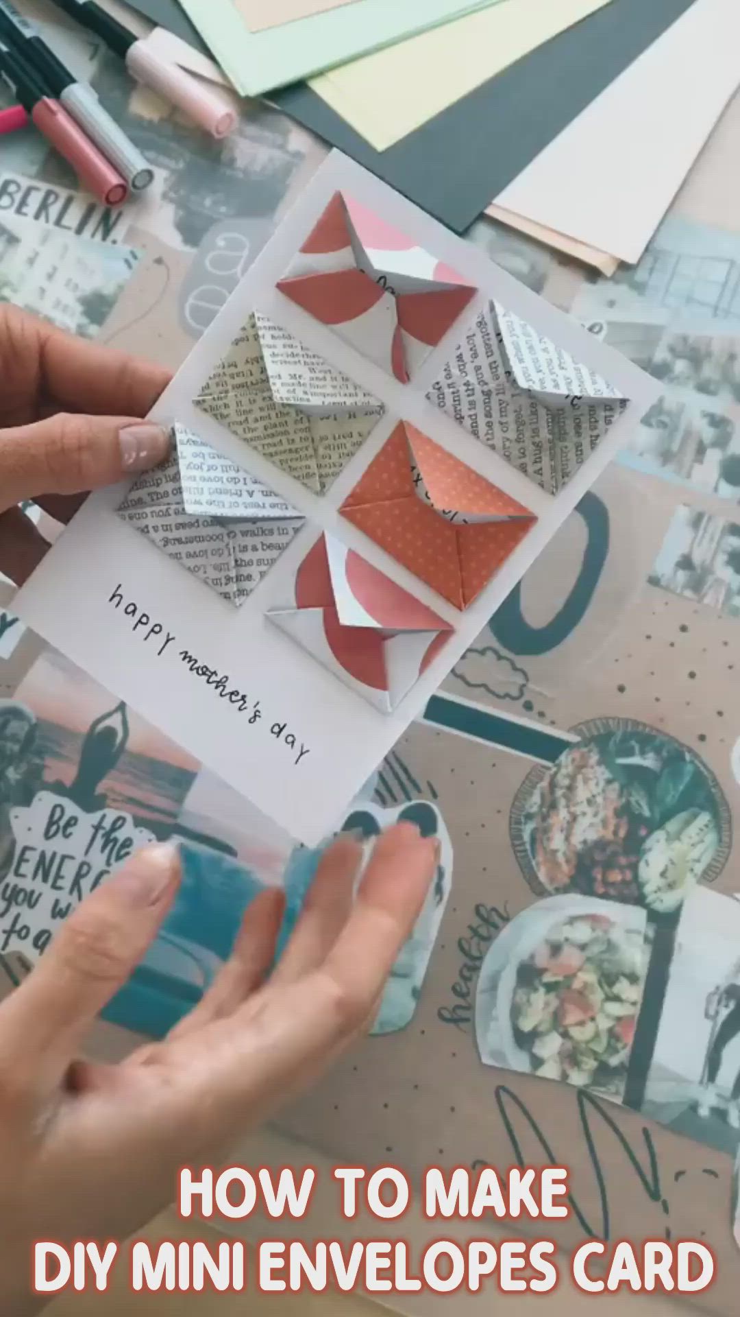 This may contain: someone is making envelopes out of different types of paper