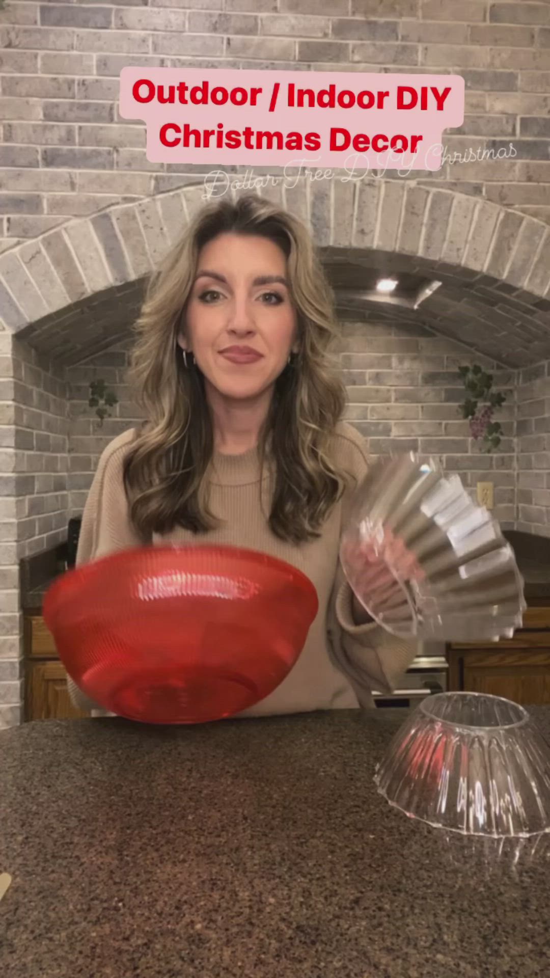 This may contain: a woman sitting at a counter with a red object in front of her and the words outdoor / indoor diy christmas decor