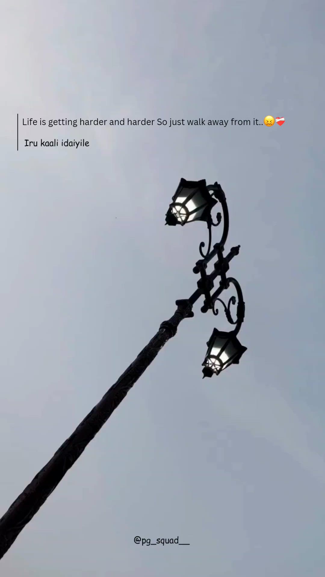 This may contain: an old fashioned street light with a quote on it