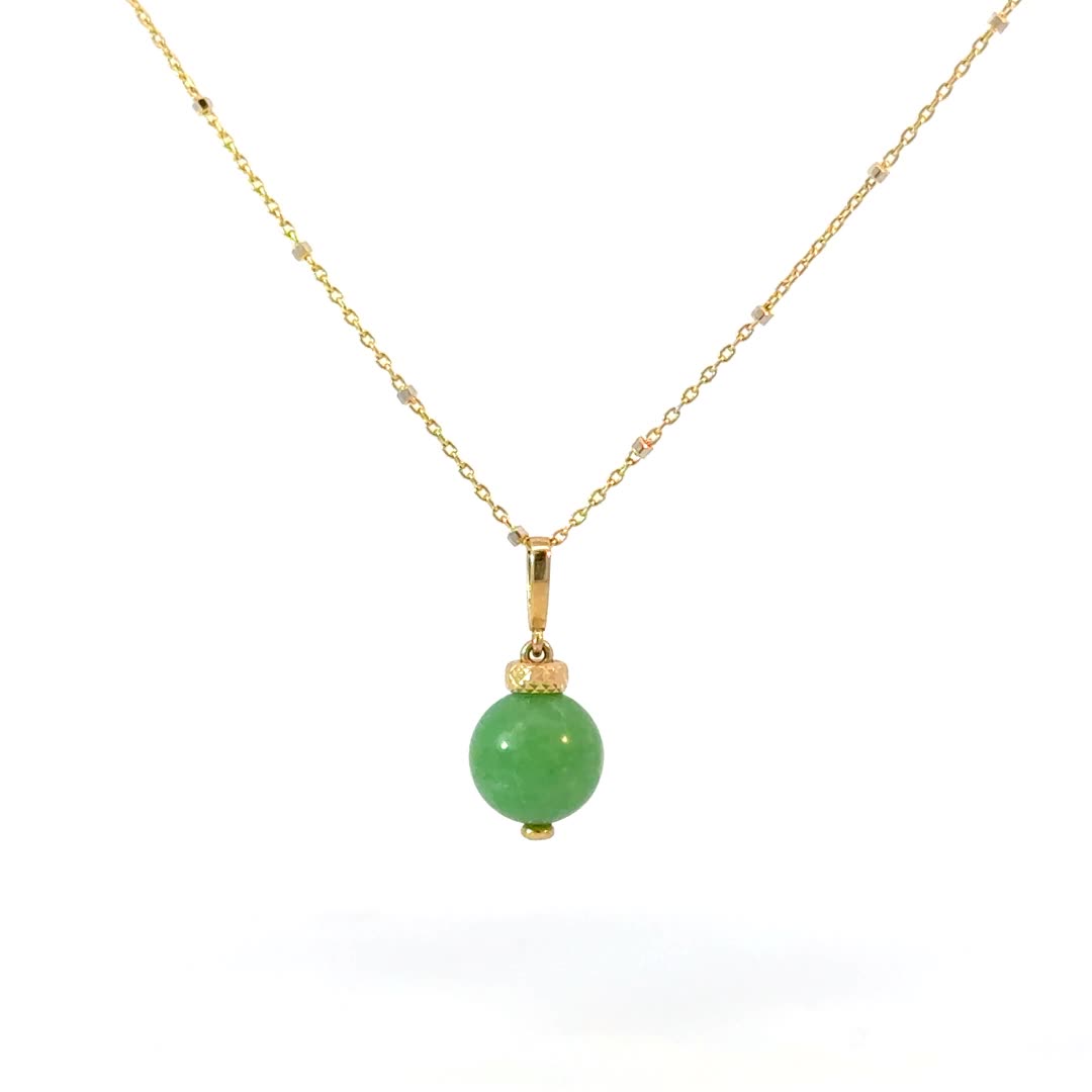 This perfect polished Jade Bauble charm is showcased in a diamond-cut 14K Gold setting. A precious symbol often associated with nobility and wealth making this a positive and beautiful forever piece. A stunning globe of color with meaning and charm. You will love all the ways it sits on your neck effortlessly. Perfect for a minimal solo statement or layered with other charms. 

Size: 28mm x 28mm
Bail: 6mm x 4mm
Center Jade: 10mm
Genuine Jade
14K Solid Gold
Lifetime Guarantee
Made in Los Angeles