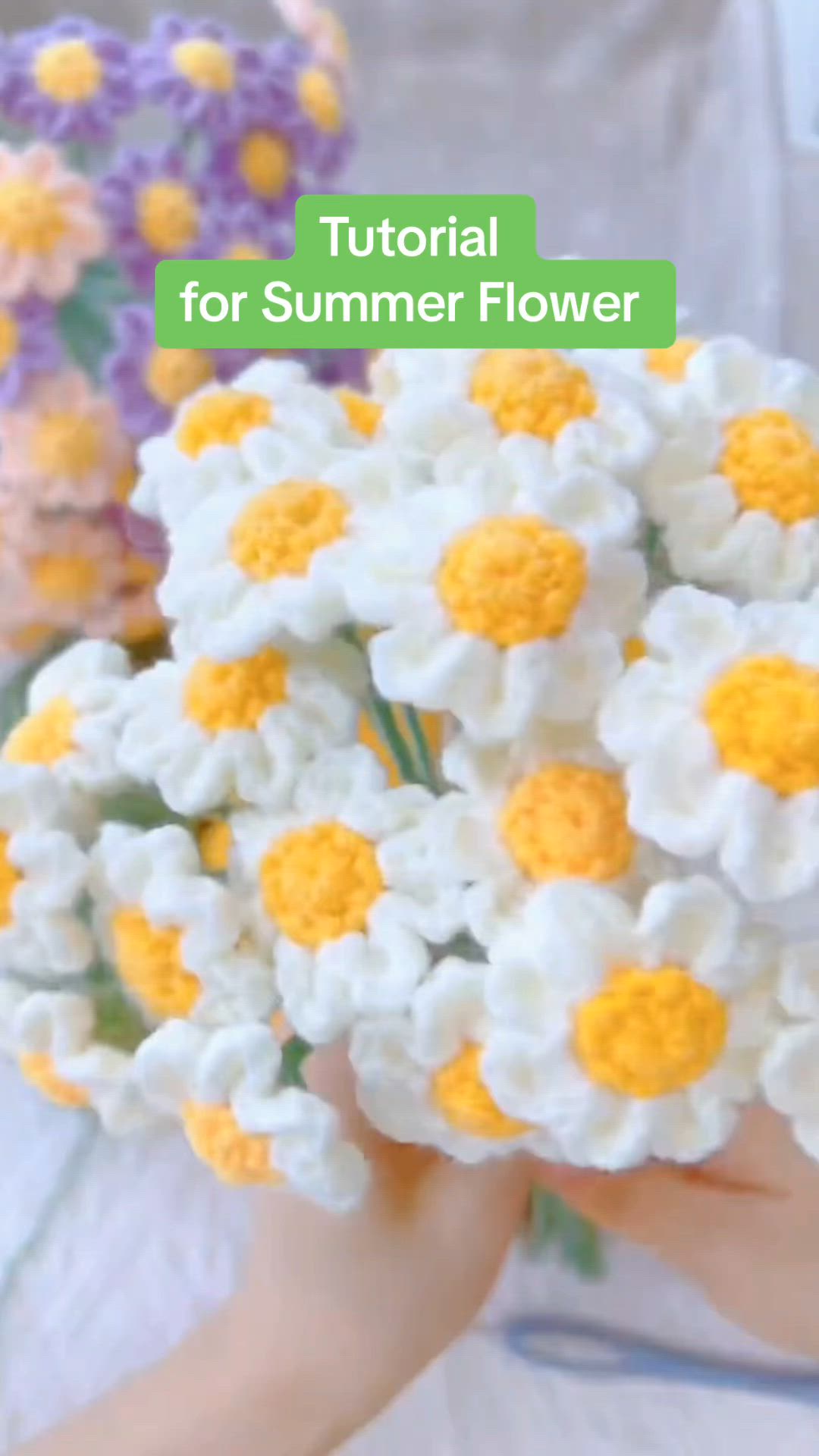 This contains: Easy Crochet Summer Flower Tutorial - Learn to craft a delightful flower with @lynnlikechochet on TikTok.