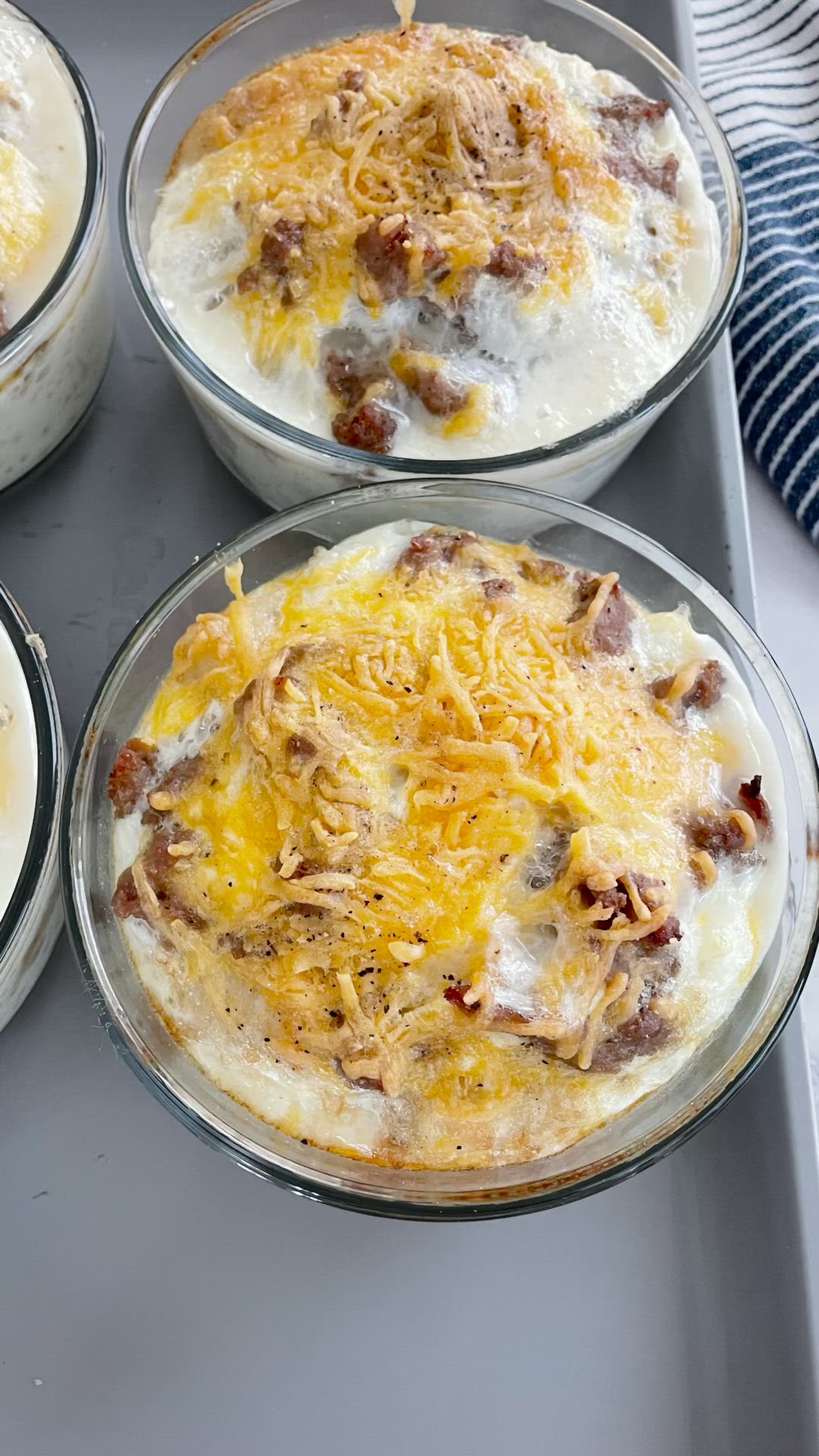 This may contain: four clear bowls filled with different types of food in each bowl, and the words i'm pleased with these