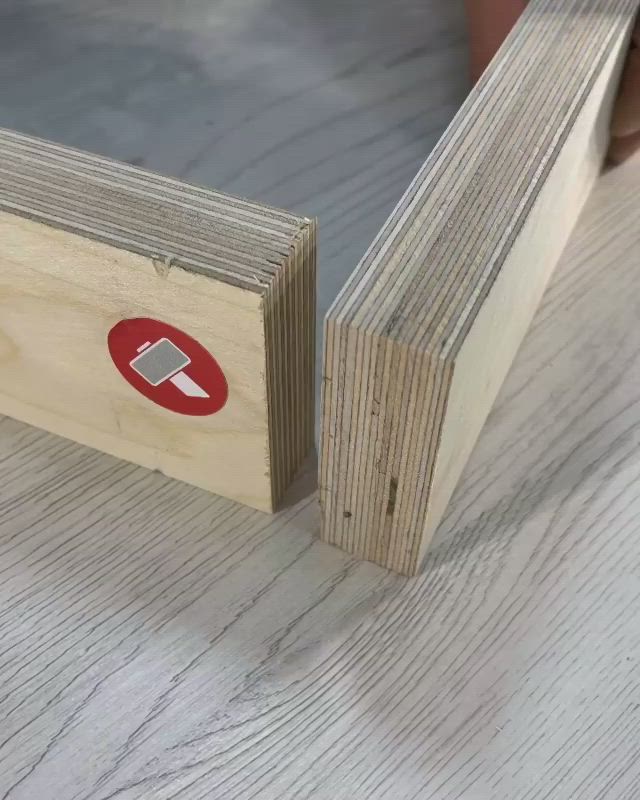 This may contain: a piece of wood sitting on top of a wooden table