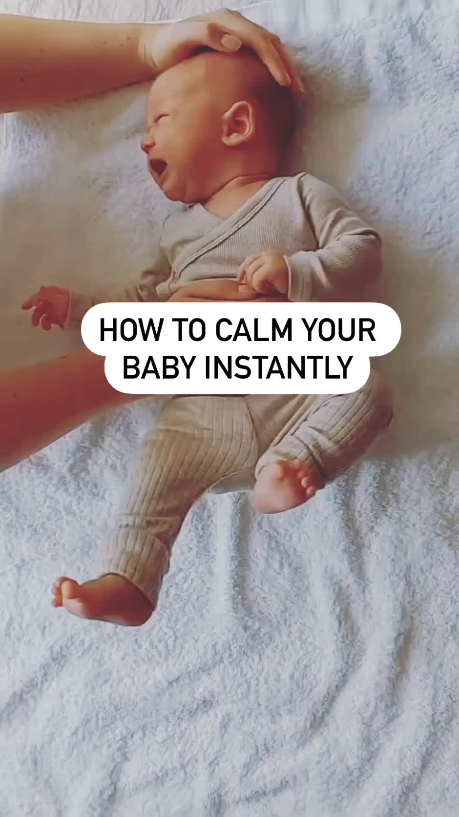 This may contain: a baby laying on top of a bed with the words how to calm your baby instantly