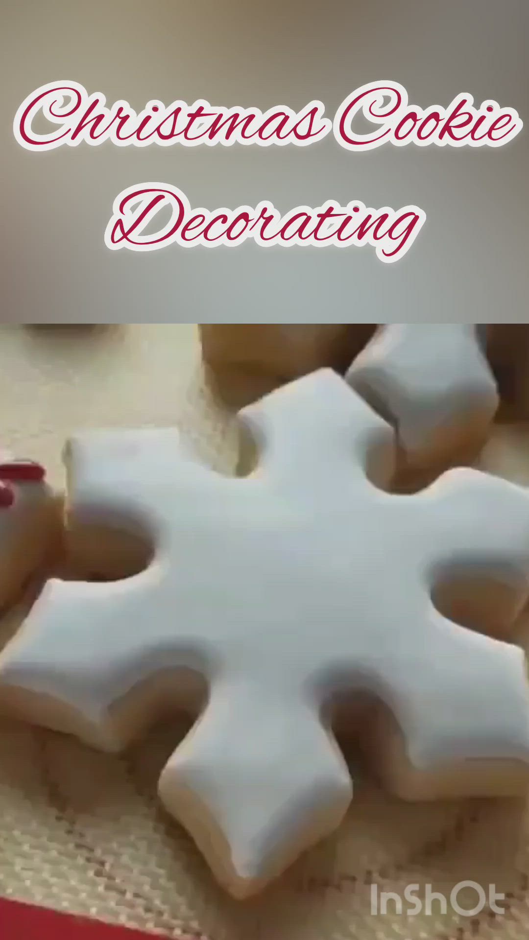 This may contain: christmas cookies decorated with red and white icing are on a table next to the words, christmas cookie decor