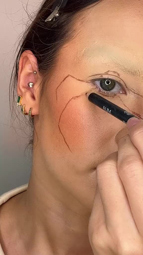 Unleash the spookiness with this spider-inspired eye makeup for Halloween! 🕷️👁️ Transform your eyes into a web of intrigue with this eerie and captivating look. Perfect for Halloween parties, this makeup tutorial will have everyone tangled in your gaze. Are you ready to embrace the Halloween spirit? Let's get webbed! #SpiderEyeMakeup #HalloweenCreep #EyesOfTheSpider