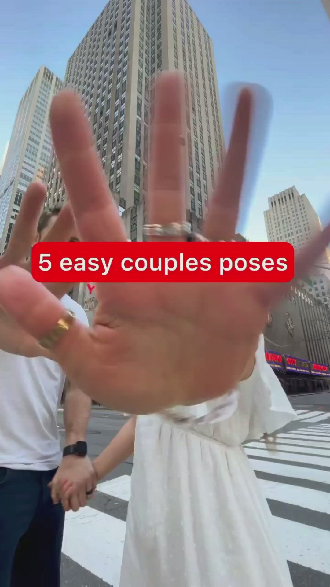 This may contain: two people holding up their hands with the words 5 easy couples poses in front of them