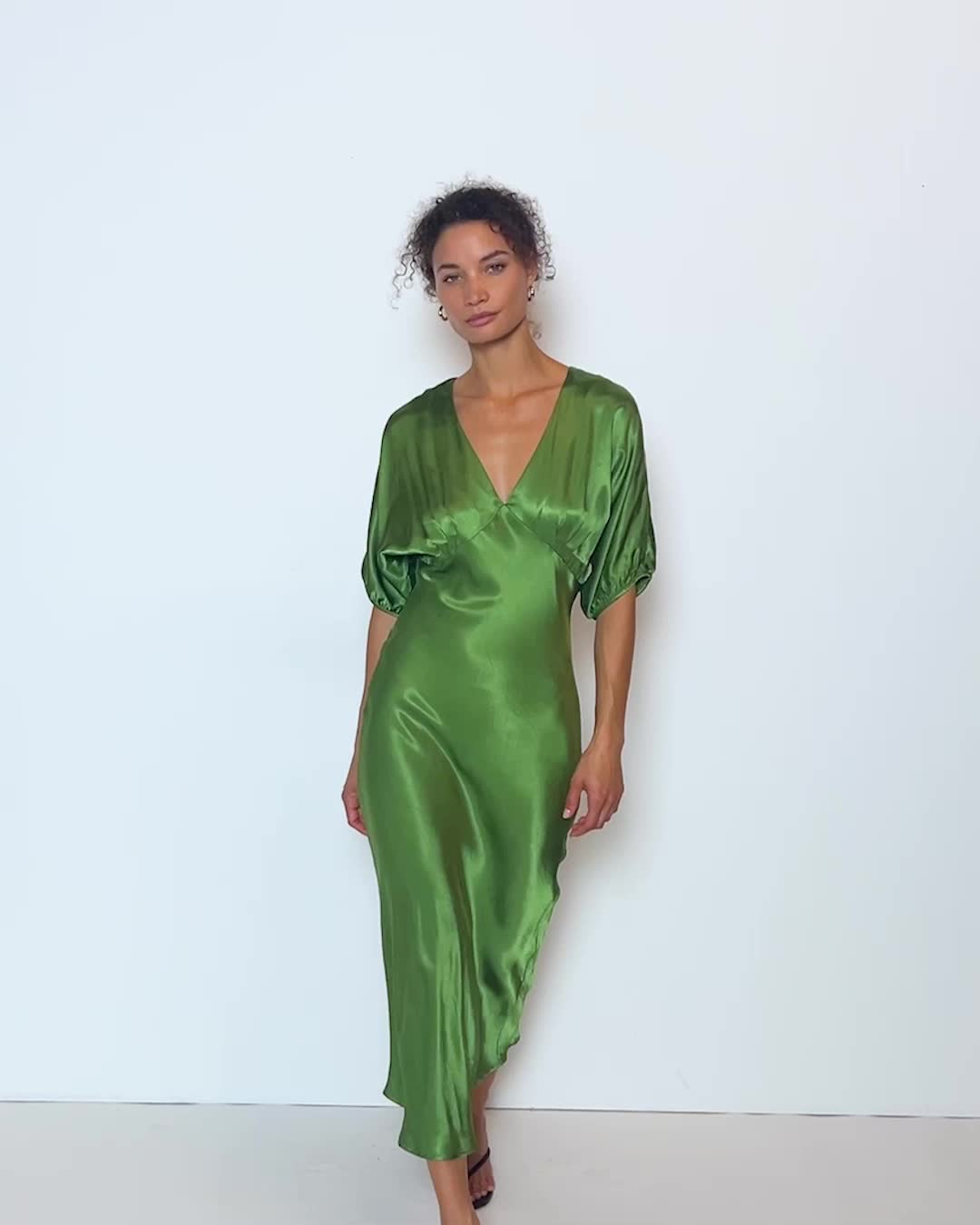 This is that event dress you'll actually wear all the time. V-neckline, bust darts, balloon sleeves, and an invisible back zipper. Cue the compliments. (This one comes in Salon Green.) | Lily-Rose Dress in Salon Green | Ethical Essentials