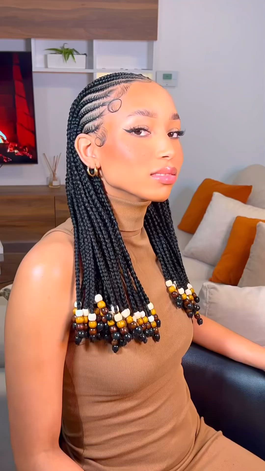 This contains an image of: braids w beads