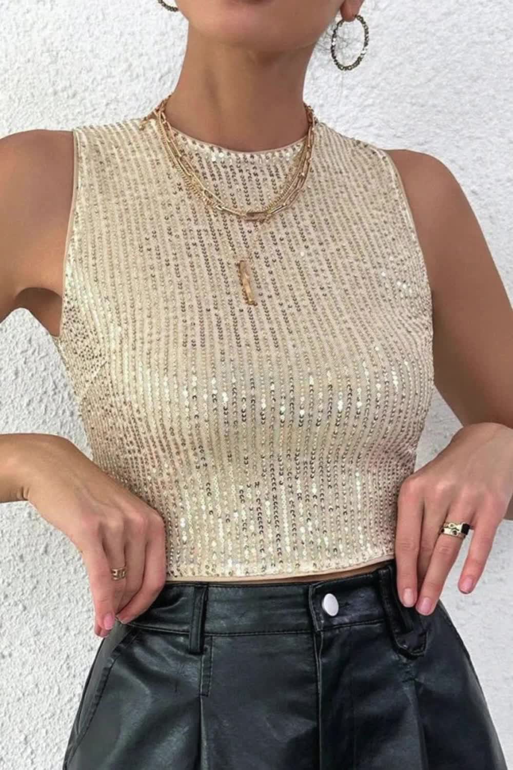 "Dazzle in this Sexy Solid Sequins Sequined O Neck Top. Adorned with sparkling sequins and featuring a flattering O-neck design, it combines glamour with sophistication, perfect for adding a touch of allure to any ensemble."