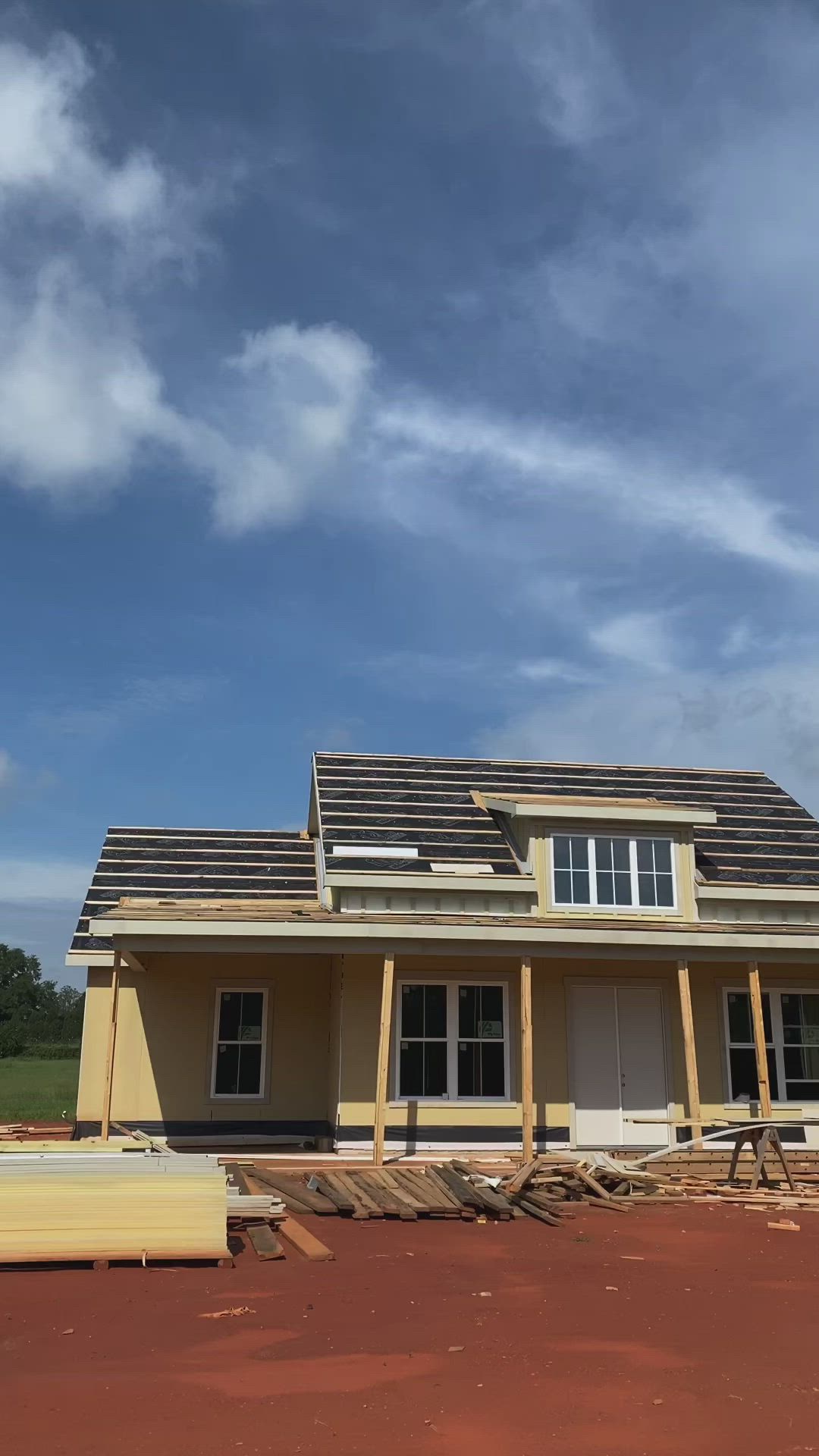 This may contain: a house under construction in the middle of nowhere