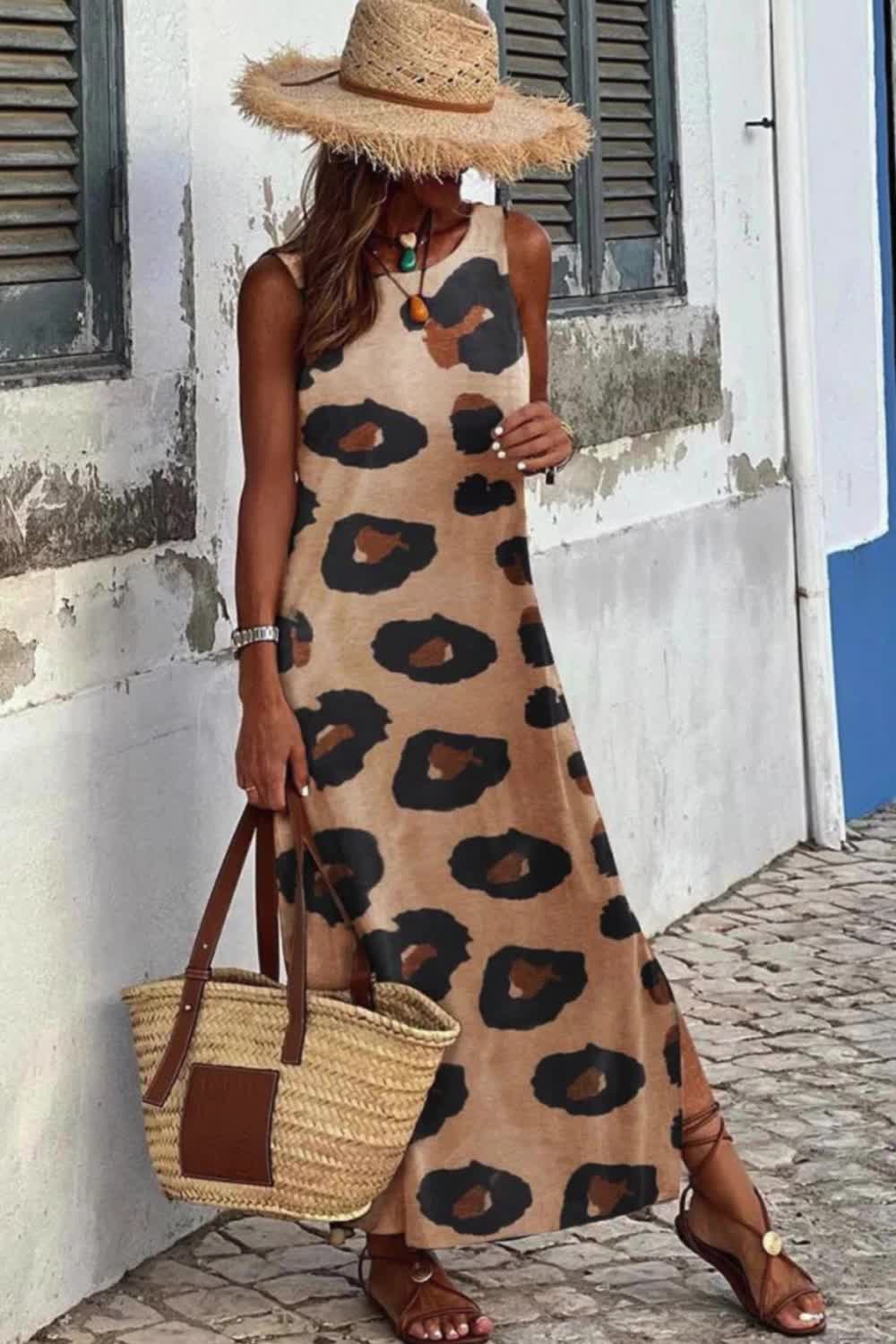 This Leopard Print Lightweight Split Back Loose Dress combines comfort and style. With its airy fabric and unique split back design, it's perfect for casual outings or adding a touch of wild elegance to your everyday look.