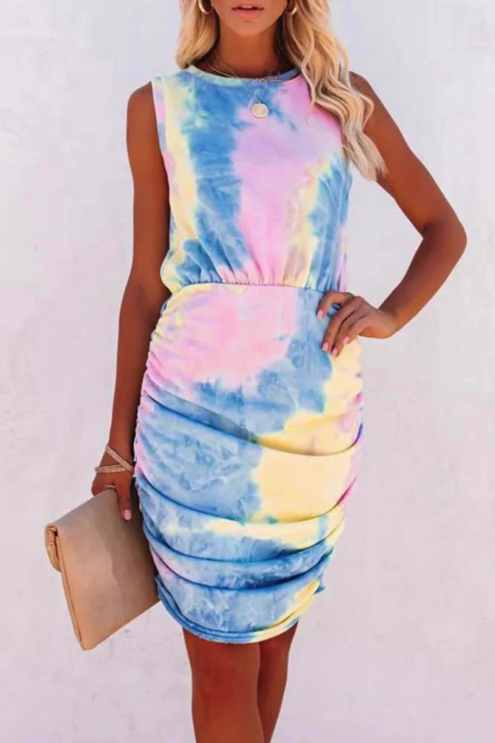 Radiate elegance in our Elegant Tie Dye Fold O Neck Wrapped Dress. The captivating tie-dye pattern and wrapped design bring a chic touch to the O-neck silhouette. Perfect for various occasions, this dress effortlessly combines trend and sophistication for a stylish and refined look that stands out with grace.