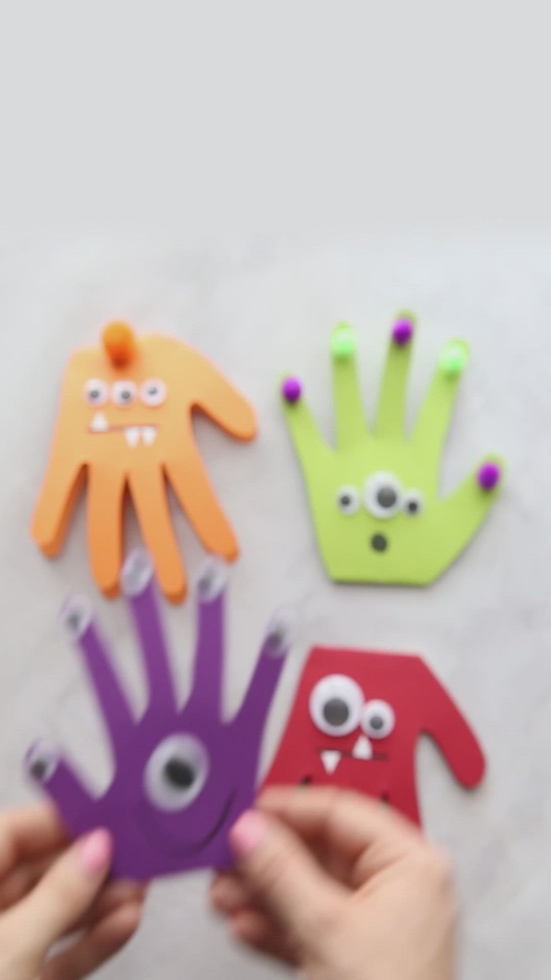 This may contain: handprint monster craft for kids to make