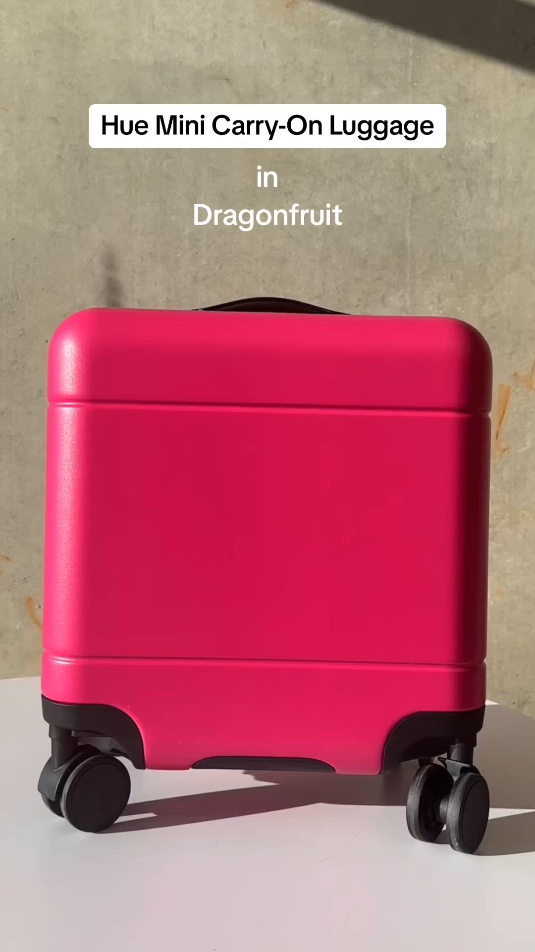 This contains an image of: Hue Mini Carry-On Luggage in Dragonfruit