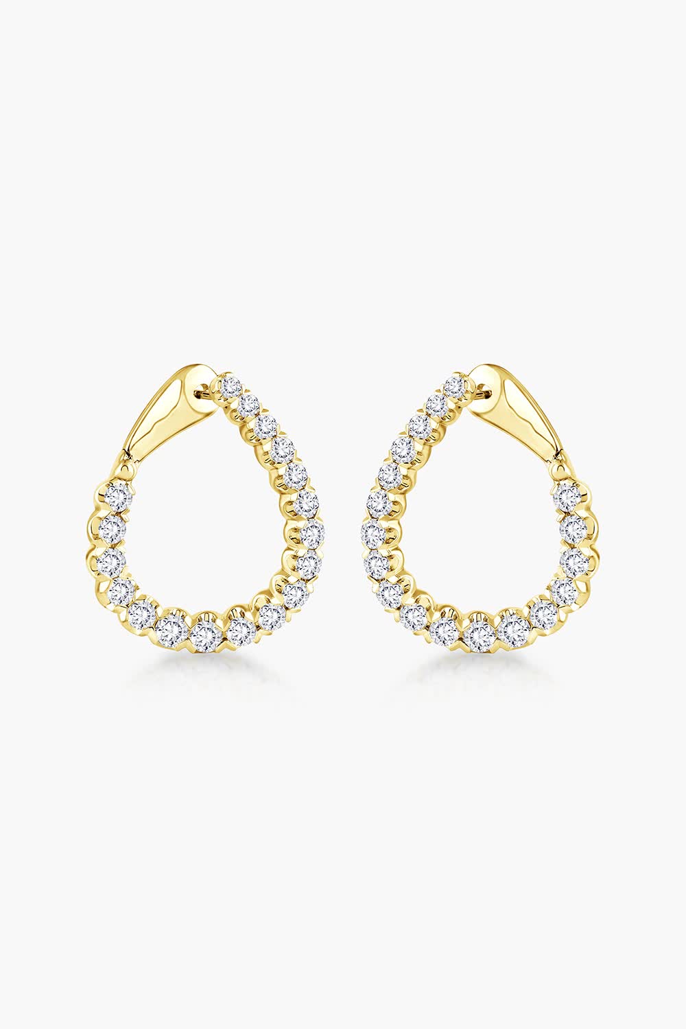 Hoops, but sassier. MiaDonna's Round Diamond Huggie Hoop Earrings shine bright in 1.0ctw and 5.0ctw of brilliant lab-grown diamonds. These huggies sit flat around the earlobe, making them classic, yet unexpected. Crafted in your choice of 14K White, Yellow, or Rose Gold, they're a perfect addition to your fall earrings stack!