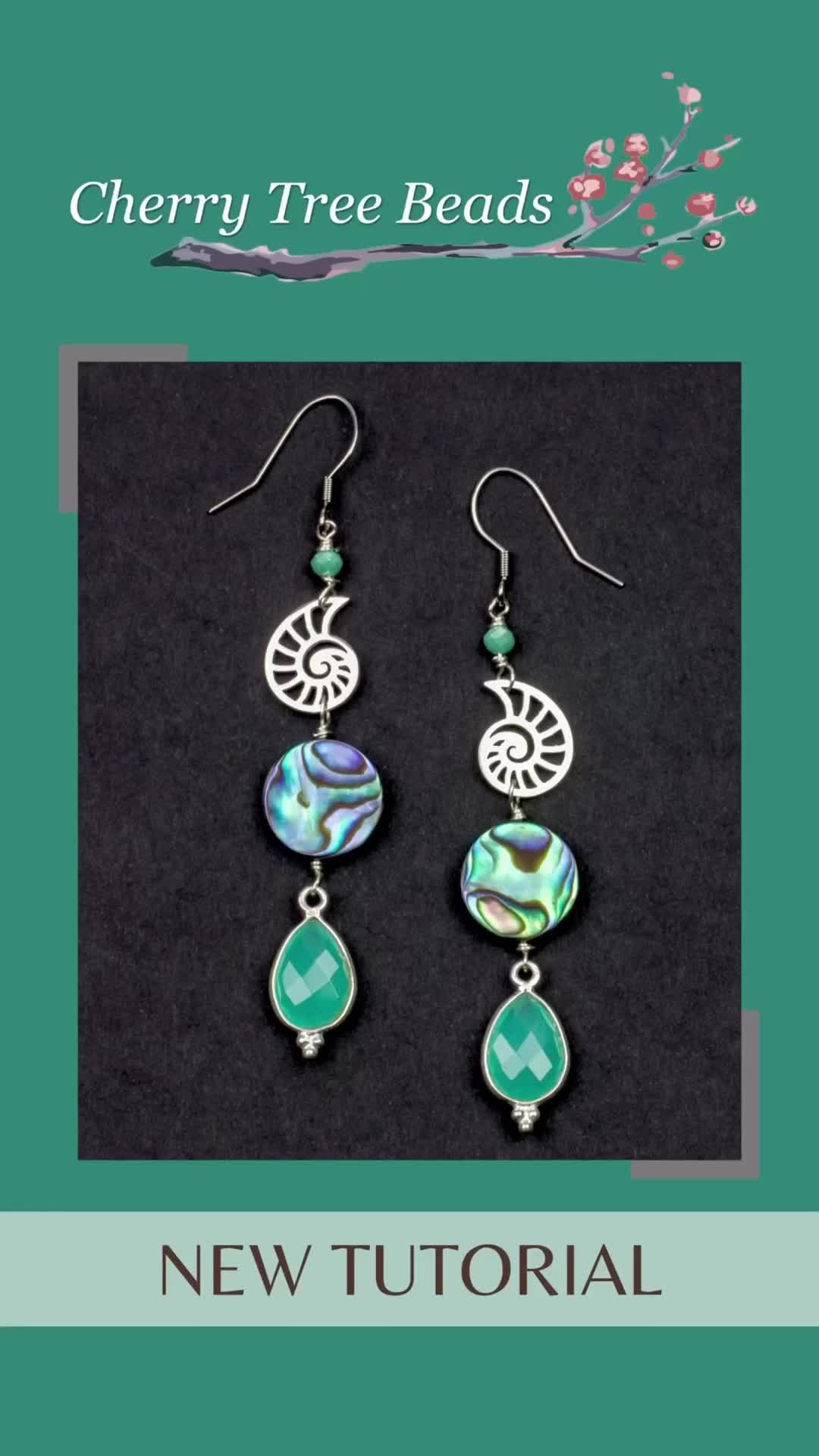 This may contain: the earrings are made with glass beads and metal wire, which have been handmade by cherry tree beads