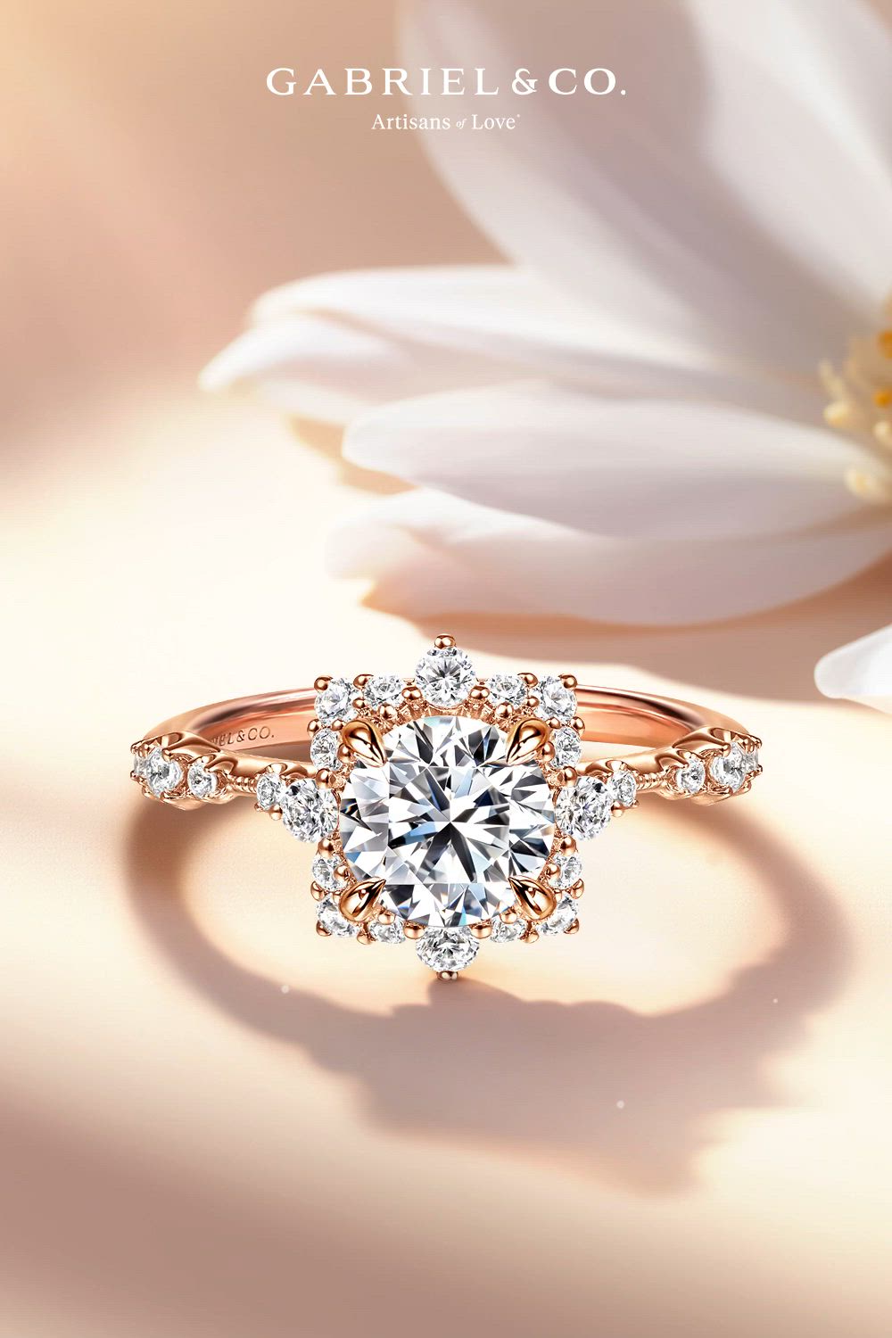 This contains: Idalia - 14K Rose Gold Fancy Halo Round Diamond Engagement Ring
ER15195R4K44JJ