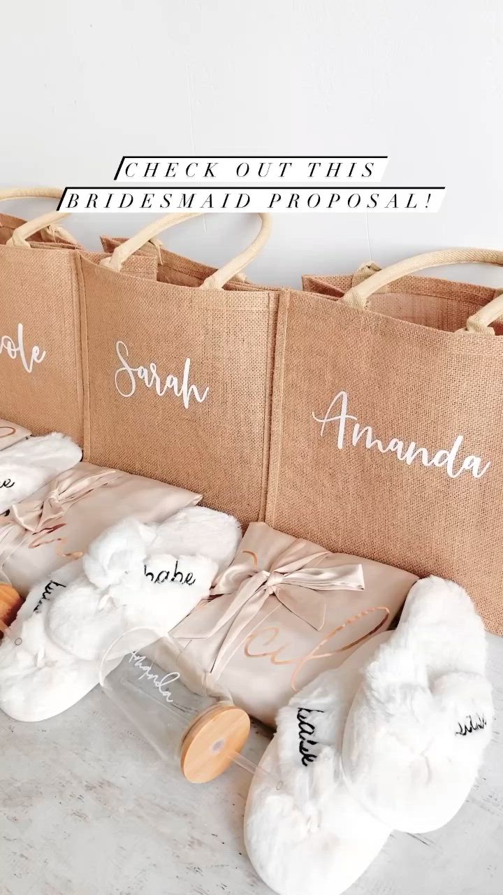 This may contain: the bridesmaid's personalized bags are lined up on top of each other