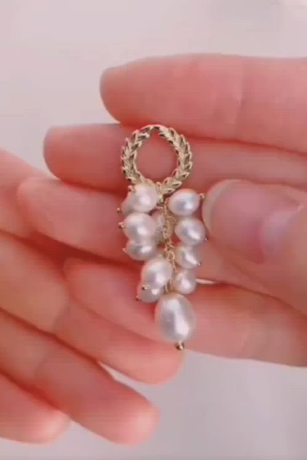 This contains an image of: handmade pearl earrings