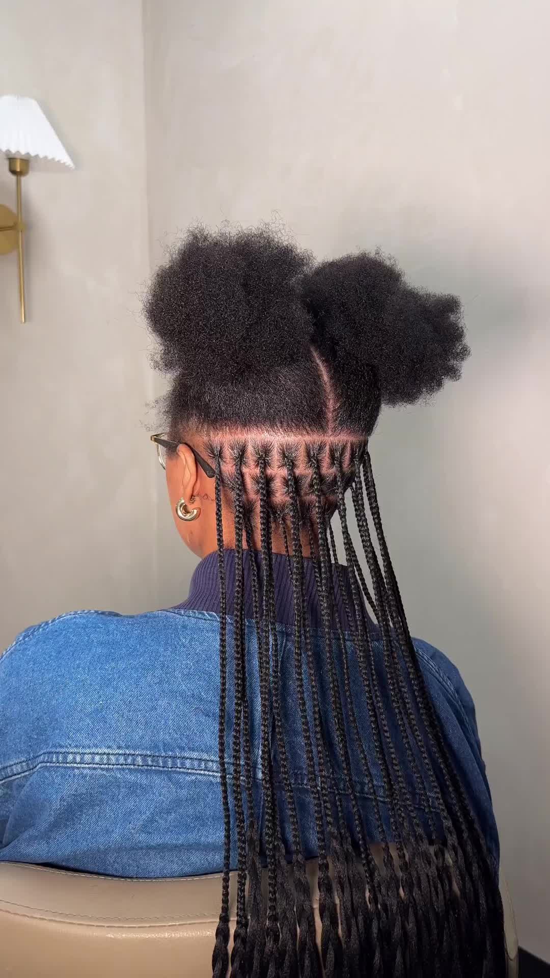 This contains: Knotless Braids