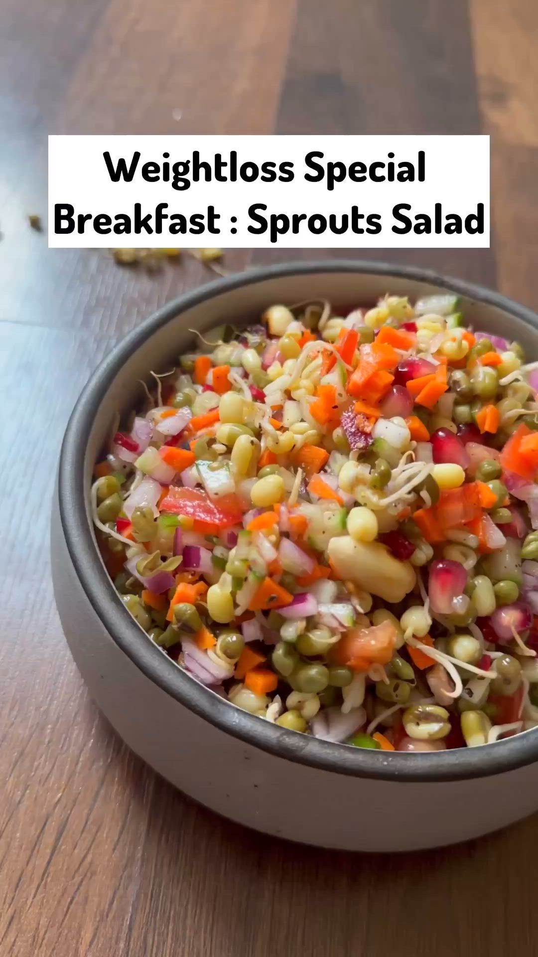 This may contain: a bowl filled with vegetables on top of a wooden table