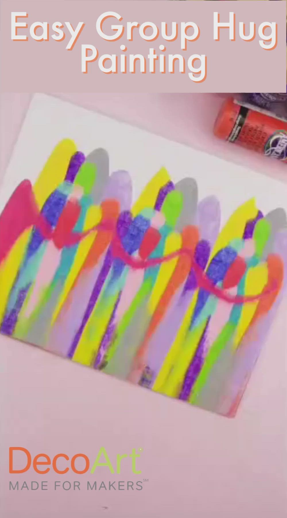 This contains: A video shows someone adding dots of paint to a canvas. Underneath the dots they add a line of paint and then swipe it all down to create a painting.