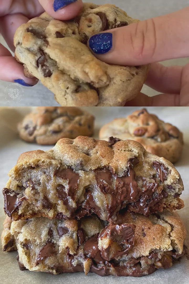 This may contain: chocolate chip cookies are stacked on top of each other and being held by a woman's hand