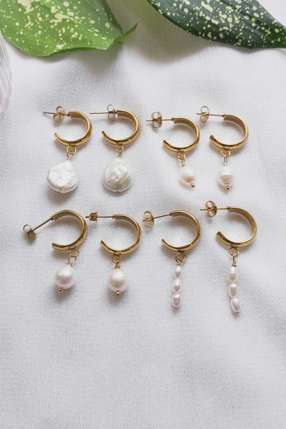 Elevate your jewelry collection with these stunning Gold Half Hoop Earrings with Pearl. Handcrafted with real freshwater and baroque pearls, set in 18k gold-plated stainless steel half-moon hoops with a stud finish. Each piece is unique and perfect for adding a touch of elegance to any outfit, from casual to formal.