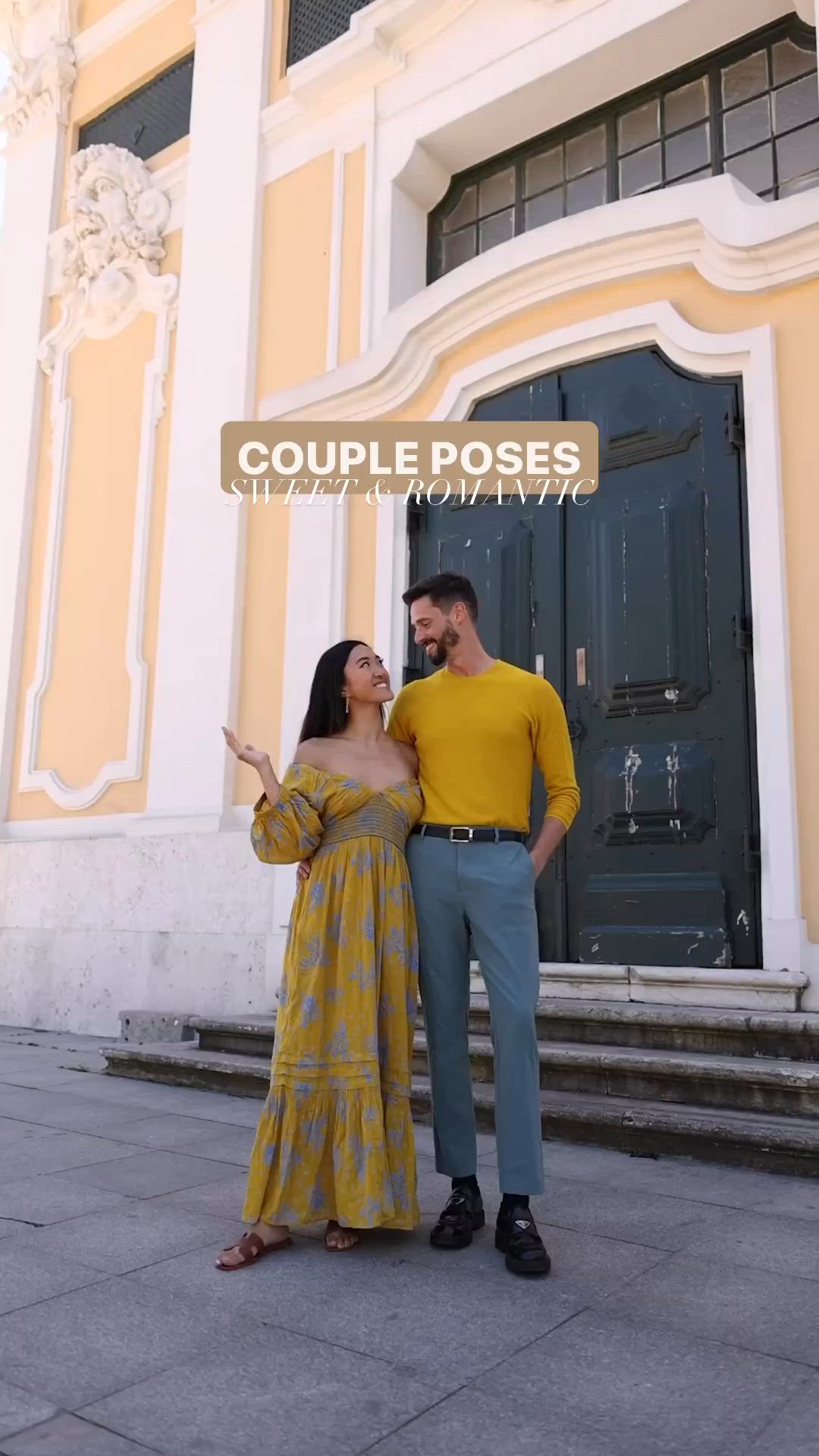 This may contain: a man and woman standing in front of a building with the caption couple poses