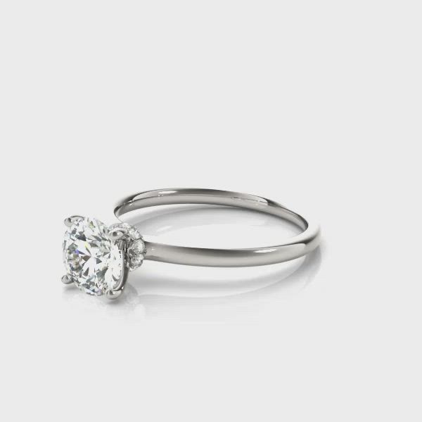 This contains: Popular Solitaire with Pave Set Diamond Collar Ring