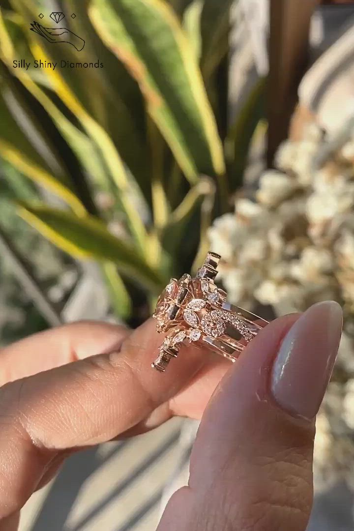 This may contain: someone is holding their engagement ring in front of some plants and flowers with the words, i do not know what they are