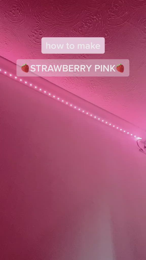 This may contain: a pink room with the words how to make strawberry pink written on it and an image of strawberries