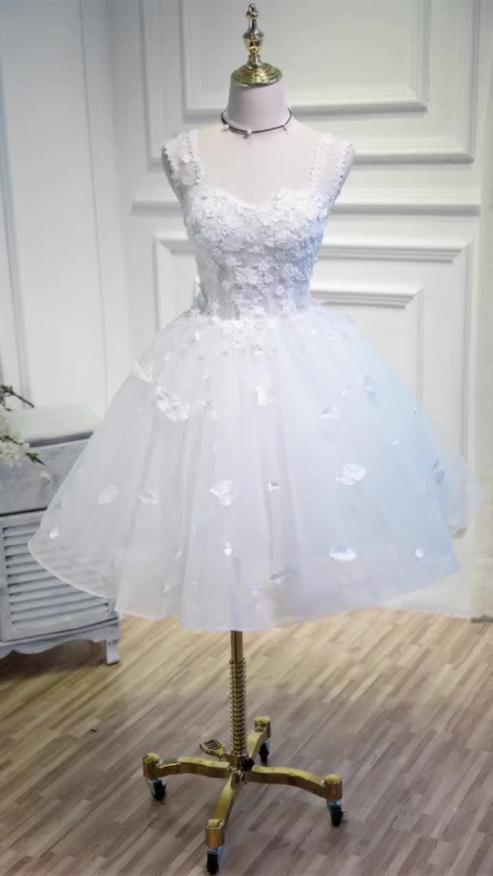 This contains: Short White Ballgown Tulle Homecoming Dress with Leafs Decoration