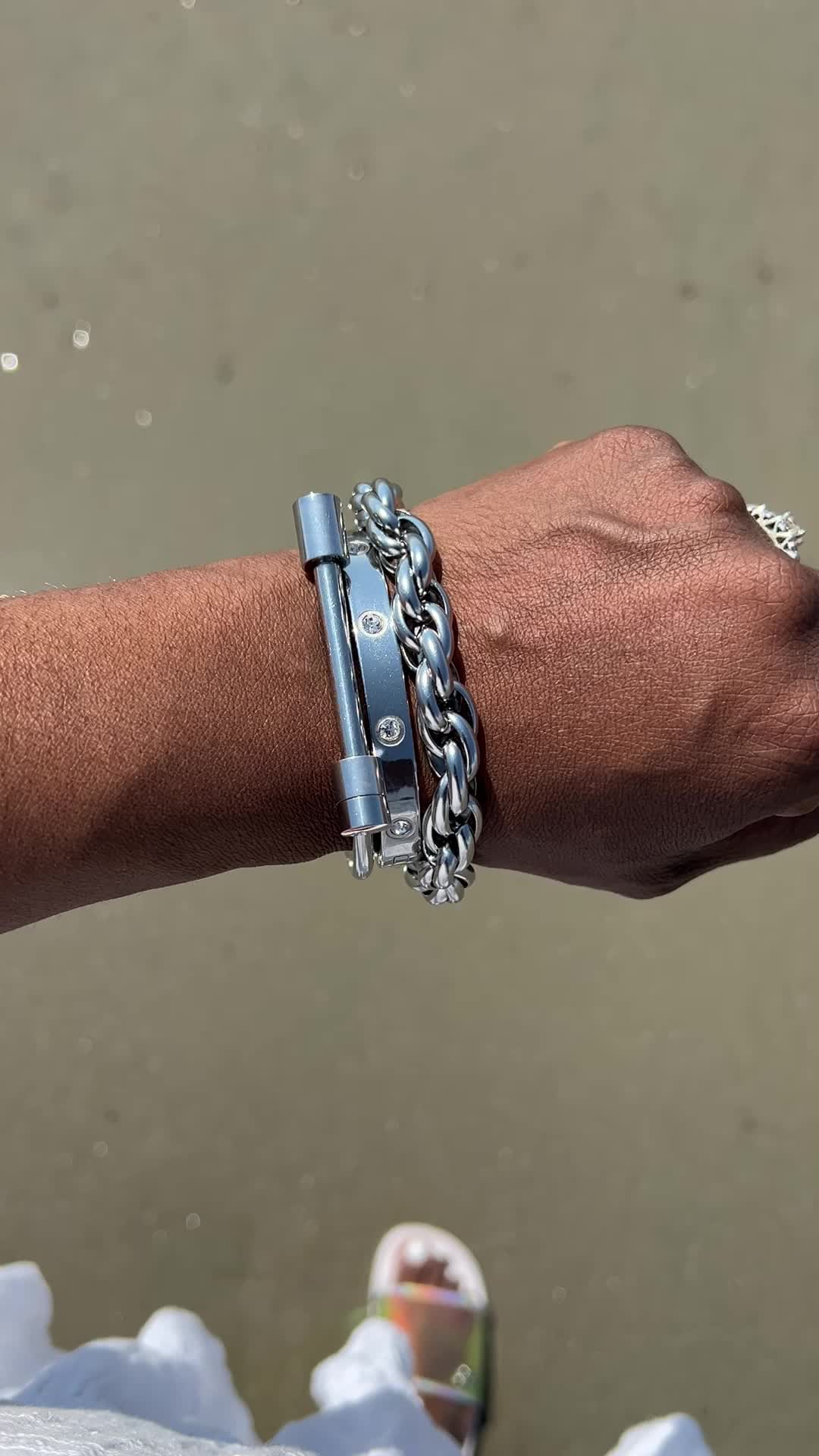 This bracelet stack includes: - Tabitha stainless steel bar bangle - Shaina stainless steel rope chain bracelet - Jillian stainless steel and cubic zirconia bangle Fits wrists up to 7 inches Bracelet size guide