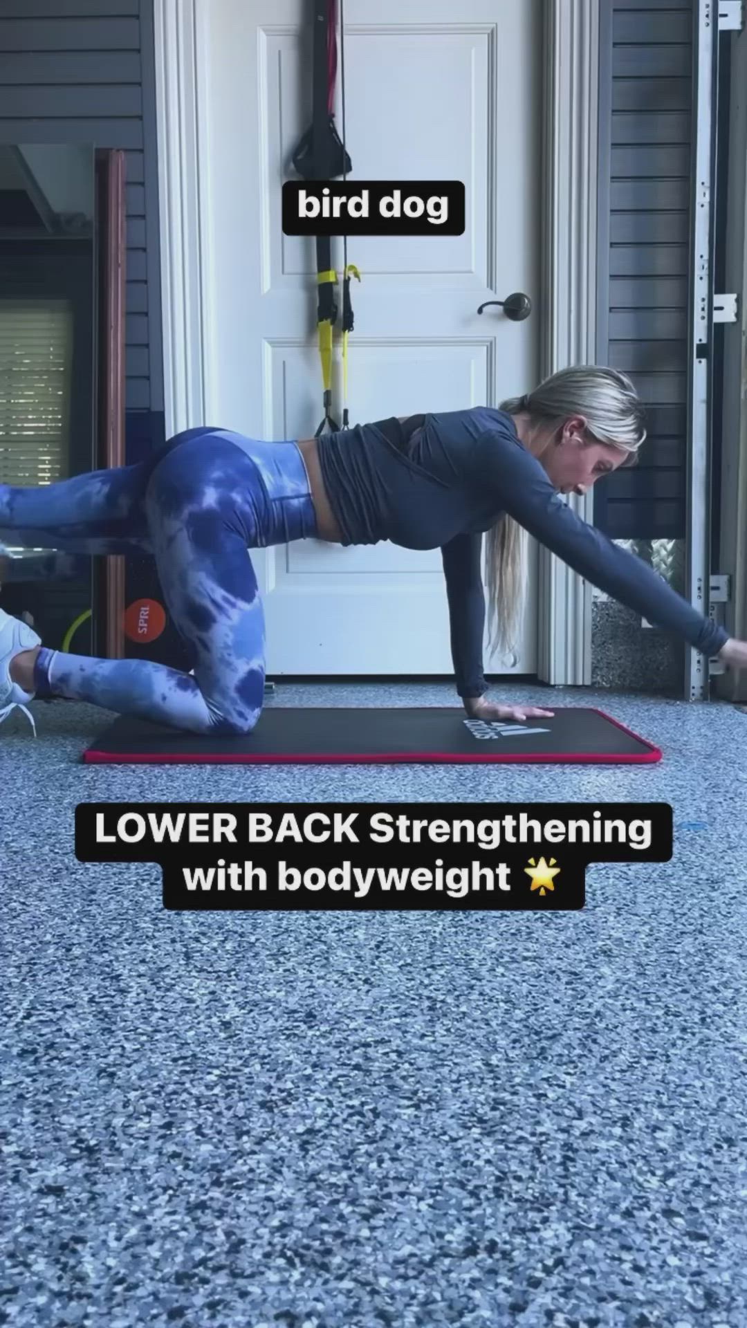 This may contain: a woman is doing a yoga pose on her mat with the words lower back stretching with bodyweight