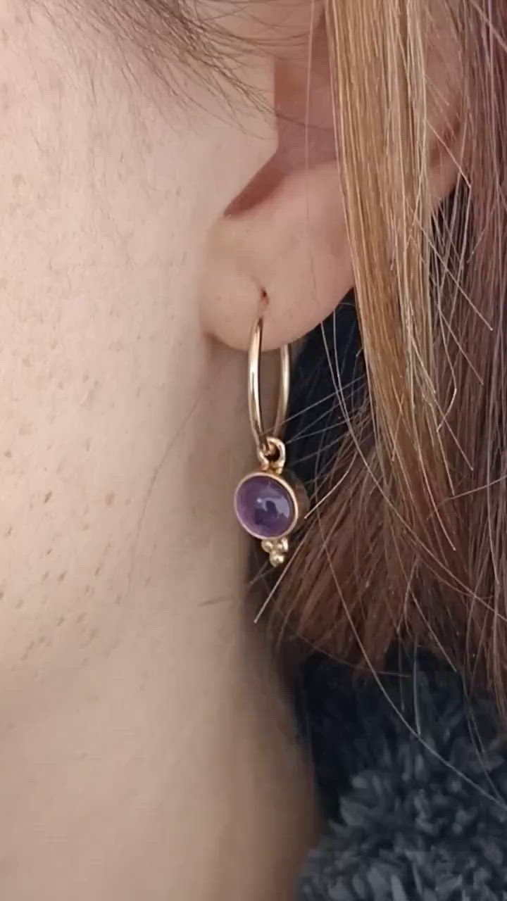 Gift-giving just got more exciting with our Amethyst Hoop Earrings! These gold-filled Amethyst dangle beauties are as versatile as they are eye-catching. They are the perfect blend of elegance and edge, making them an ideal addition to any jewelry collection. Whether you're treating yourself to a special gift or surprising a loved one, these earrings are sure to be a hit! Pin now to remember this unique gift idea.