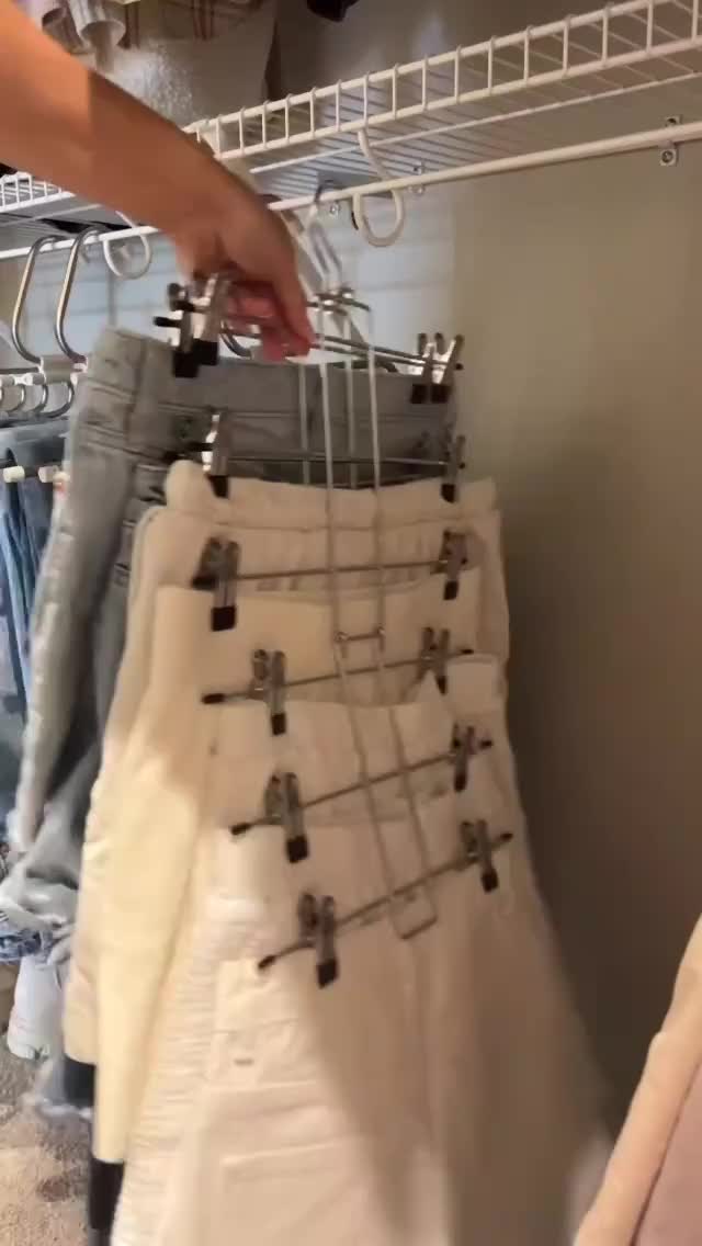 This contains: Pants Hangers with Clips