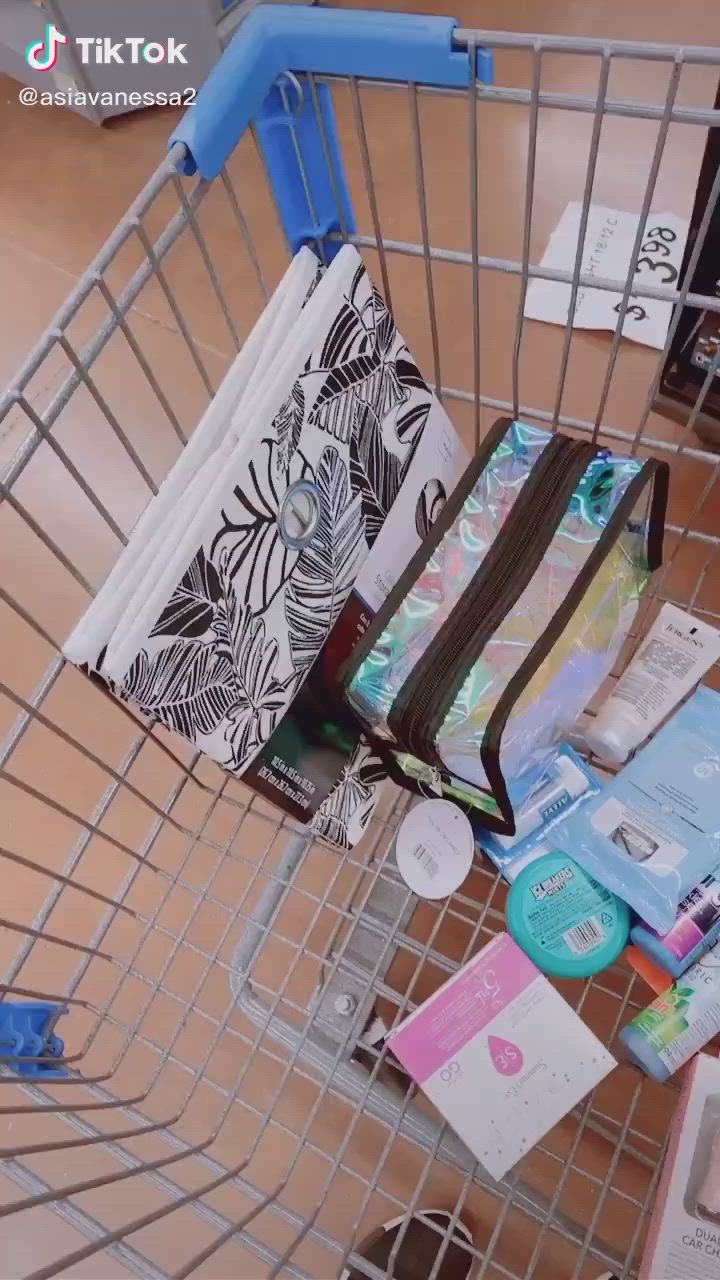 This may contain: a shopping cart filled with lots of items