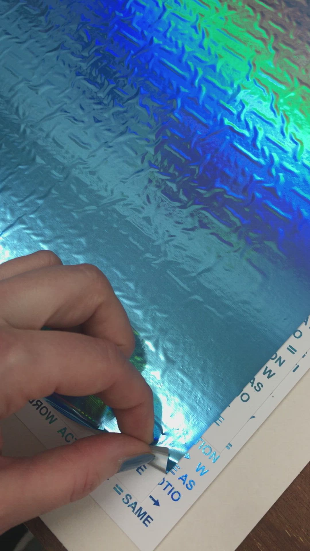 This contains: Holographic typography poster