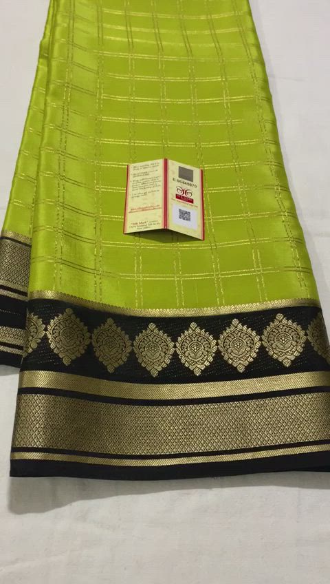 This contains an image of: MYSORE SILK IN GREEN AND BLACK@ OFFER PRICE Rs.9500