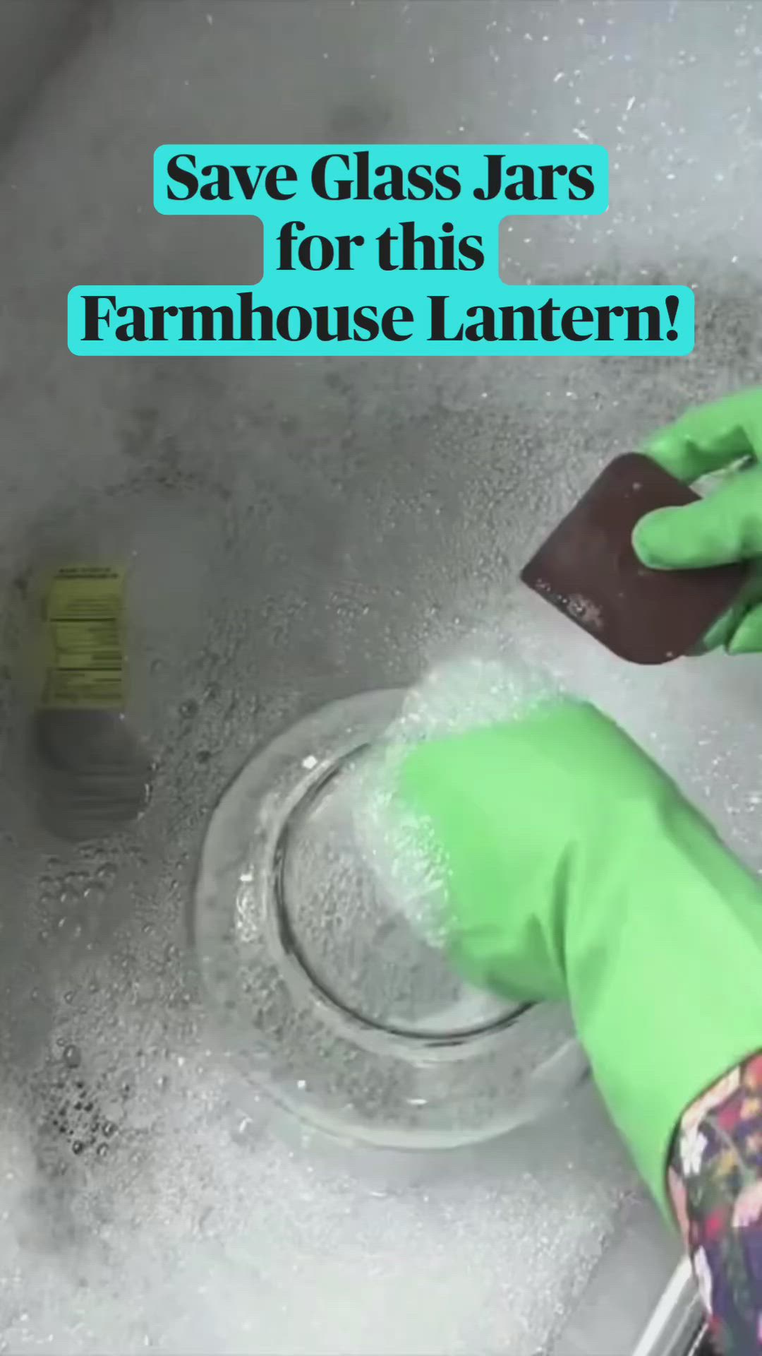 This may contain: a person in green gloves cleaning a sink