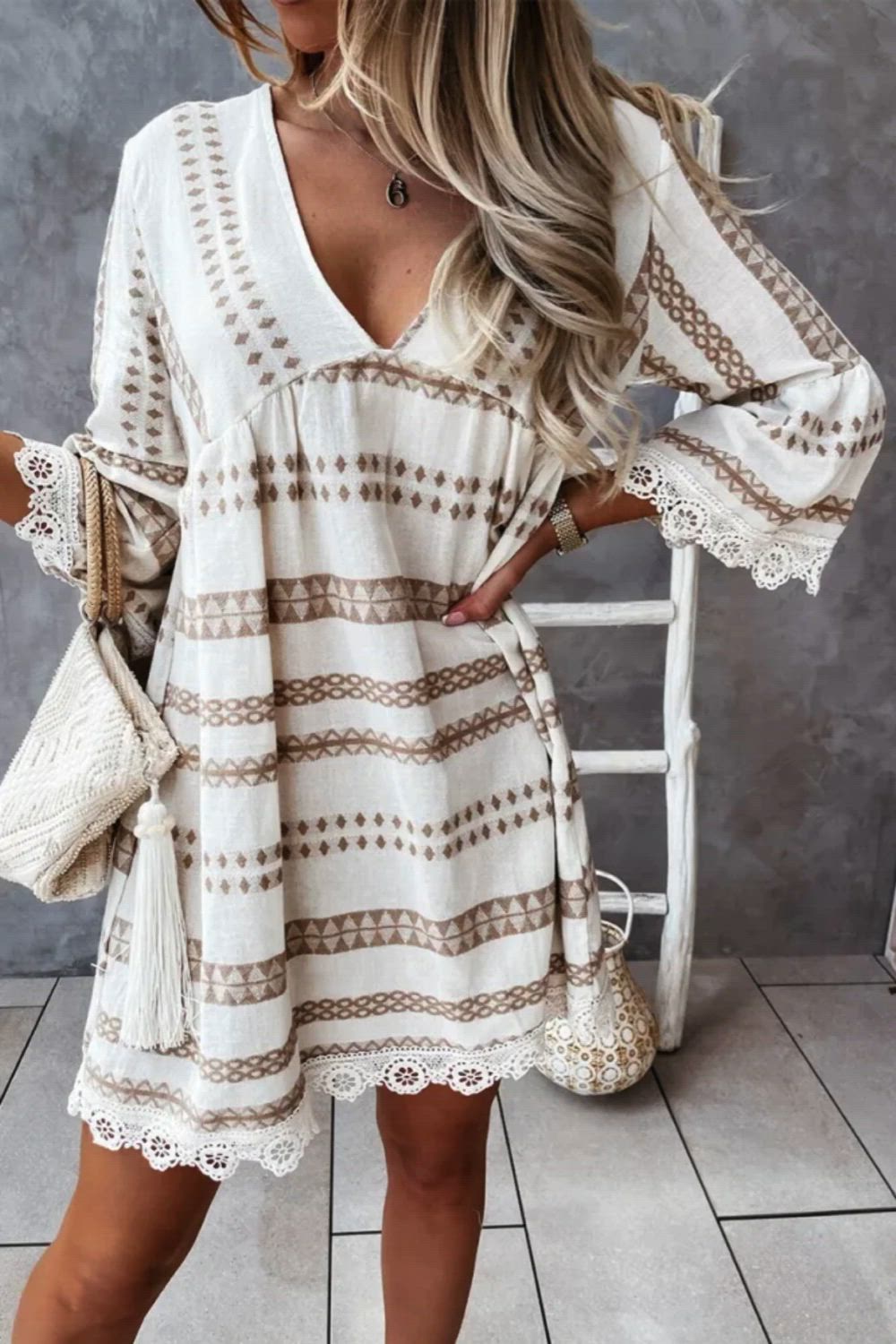 The Casual Print Lace Patchwork V Neck Dress is a delightful blend of casual and feminine style. With its charming print and delicate lace patchwork detailing, it exudes elegance. The V-neckline adds a touch of allure, making it perfect for everyday wear or dressed up with accessories for a more polished look.