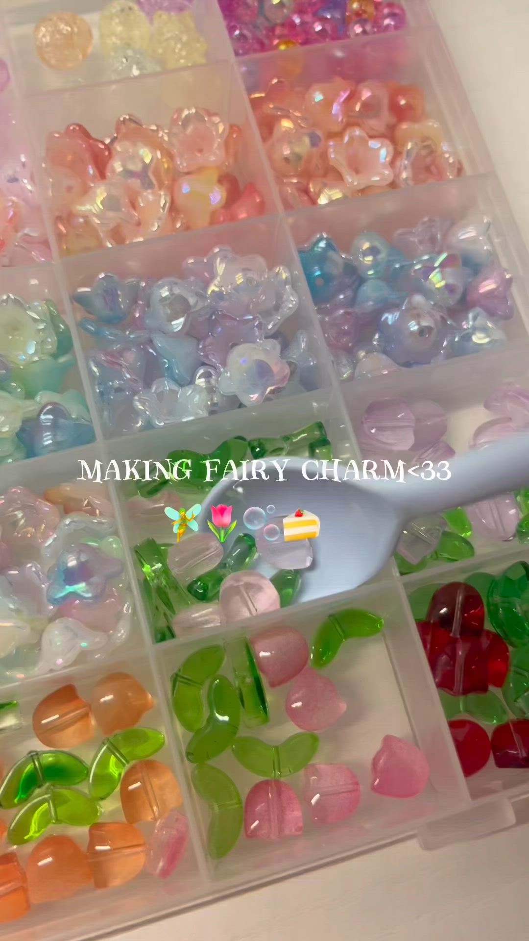 This may contain: a plastic container filled with lots of different colored beads